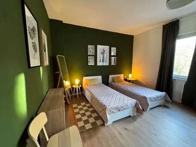 Ein Bett oder Betten in einem Zimmer der Unterkunft Big apartment with Parking, 30 min to Düsseldorf