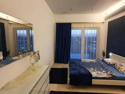 Ein Bett oder Betten in einem Zimmer der Unterkunft Phönixsee - Studio mit Küche, Bad und Dachterrasse