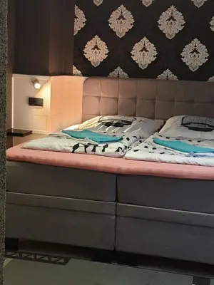 Ein Bett oder Betten in einem Zimmer der Unterkunft Waldhotel Lemberg