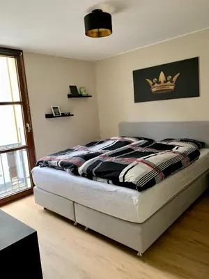 Ein Bett oder Betten in einem Zimmer der Unterkunft Kleiner Koenig - Appartement im Stadtzentrum