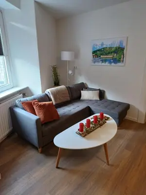 Ein Sitzbereich in der Unterkunft HeimatHerz Hotel Garni