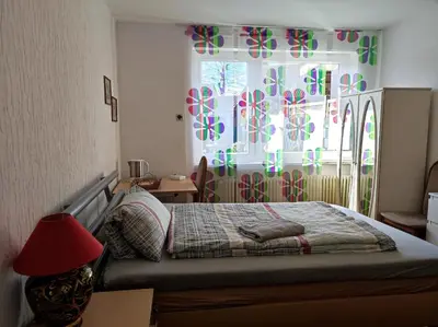 Ein Bett oder Betten in einem Zimmer der Unterkunft Uni-nähe Unterkunft mit Garten