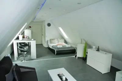 Ein Bett oder Betten in einem Zimmer der Unterkunft TRUTH Studio - Küche - Top Internet - Parkplatz - Modern