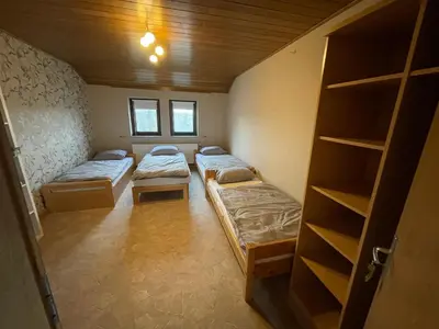 Ein Bett oder Betten in einem Zimmer der Unterkunft Monteurwohnungen-Dinslaken
