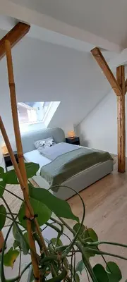 Ein Bett oder Betten in einem Zimmer der Unterkunft Waldstadt-Apartments