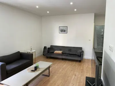 Ein Sitzbereich in der Unterkunft Apartment HomeBo