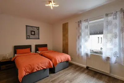 Ein Bett oder Betten in einem Zimmer der Unterkunft Ferienwohnung Mitten im Pott