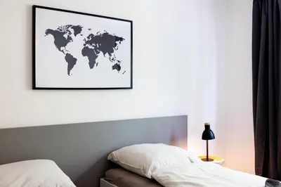 Ein Bett oder Betten in einem Zimmer der Unterkunft Glück Auf Appartements Schleiermacherstraße Duisburg