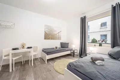Ein Bett oder Betten in einem Zimmer der Unterkunft work & stay in Gelsenkirchen