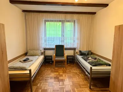Ein Bett oder Betten in einem Zimmer der Unterkunft Duisburg FeelHome, Flughafen nah,3-Schlafzimmer, Dusche ebenerdig, Zentral, WiFi, Ground Floor