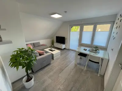 Ein Sitzbereich in der Unterkunft Moderne Wohnung nah am Cappenberger-See, 1-4 Gäste