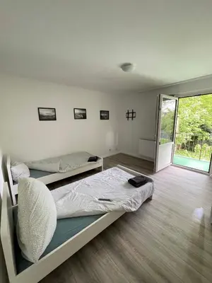Ein Bett oder Betten in einem Zimmer der Unterkunft estrella24 LIVING ROOMS London