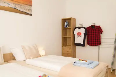 Ein Bett oder Betten in einem Zimmer der Unterkunft Ferienwohnung für 4, mitten in Solingen
