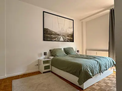 Ein Bett oder Betten in einem Zimmer der Unterkunft Ruhrgebiet-Apartments in Duisburg Stadtmitte