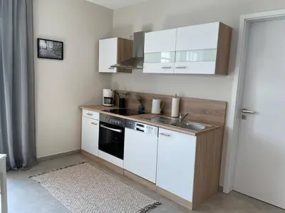 Küche/Küchenzeile in der Unterkunft Studio - Apartment Steinmetz mit Balkon