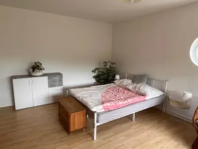 Ein Bett oder Betten in einem Zimmer der Unterkunft Ferienwohnungen Waldblick