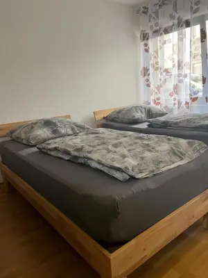 Ein Bett oder Betten in einem Zimmer der Unterkunft Ferienwohnung in der Kulturhauptstadt