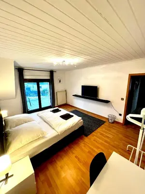 Ein Bett oder Betten in einem Zimmer der Unterkunft Gemütliches Zimmer mit großer Terrasse Nähe Messe, Flughafen & PSD Dome
