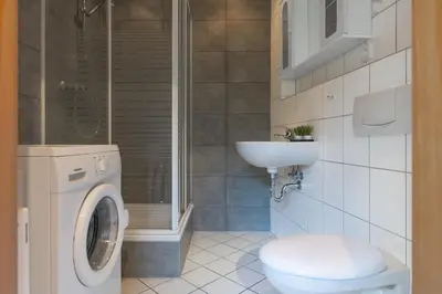 Ein Badezimmer in der Unterkunft T&K Apartments - 1-3 Zimmer Apartments - Essen