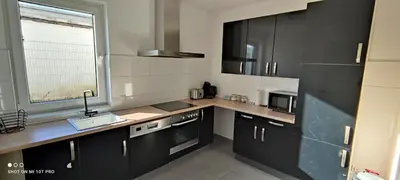 Küche/Küchenzeile in der Unterkunft Neue Doppelhaushälfte mit Terrasse, Balkon und Garten