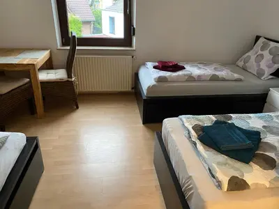 Ein Bett oder Betten in einem Zimmer der Unterkunft WORK & TRAVEL Apartment - Gratis NETFLIX - seht gute Verkehrsanbindung