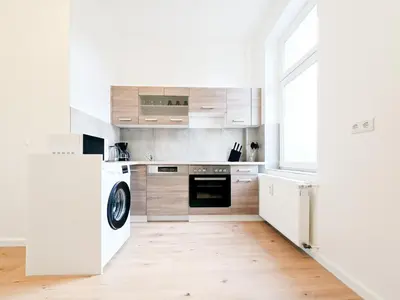 Küche/Küchenzeile in der Unterkunft Tolstov Apartments - Several 1 Room Fitter Apartments with kitchen and washing machine - 25 Min Messe DUS