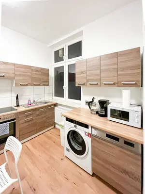 Küche/Küchenzeile in der Unterkunft Tolstov Apartments - Several 1 Room Fitter Apartments with kitchen and washing machine - 25 Min Messe DUS