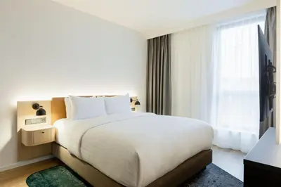 Ein Bett oder Betten in einem Zimmer der Unterkunft Residence Inn by Marriott Dortmund City
