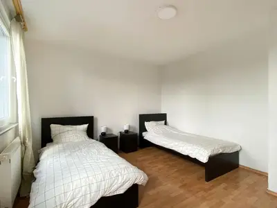 Ein Bett oder Betten in einem Zimmer der Unterkunft City Appartement