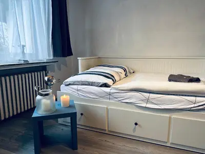 Ein Bett oder Betten in einem Zimmer der Unterkunft Whg 21 Ferienhaus mit Garten und Terrasse 130 qm