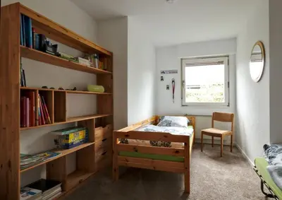 Ein Bett oder Betten in einem Zimmer der Unterkunft FeWo Clemens - Wohnküche + 2 Schlafräume + Bad + Terrasse