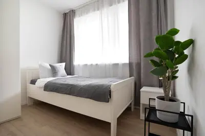 Ein Bett oder Betten in einem Zimmer der Unterkunft Apartments in the city center I home2share
