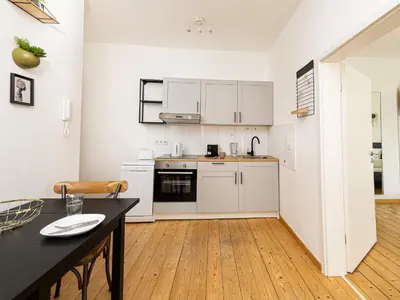 Küche/Küchenzeile in der Unterkunft Fabelhafte Apartments zum wohlfühlen mit JUNIK Apartments