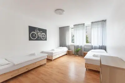 Ein Bett oder Betten in einem Zimmer der Unterkunft T&K Apartments - 3 Room Apartment