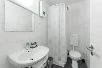 Ein Badezimmer in der Unterkunft T&K Apartments - 3 Room Apartment