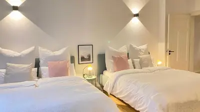Ein Bett oder Betten in einem Zimmer der Unterkunft Luxuriöses Altbau im Szenenviertel