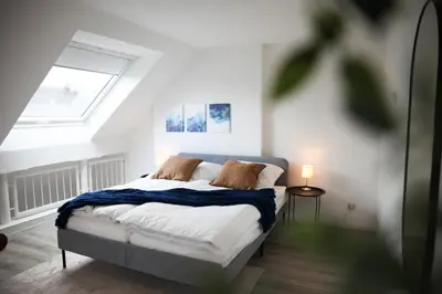Ein Bett oder Betten in einem Zimmer der Unterkunft BEECH APARTMENT: MAISONETTE + FREE PARKING + NETFLIX