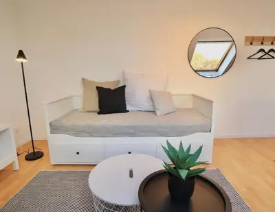 Ein Sitzbereich in der Unterkunft BEECH APARTMENT: MAISONETTE + FREE PARKING + NETFLIX