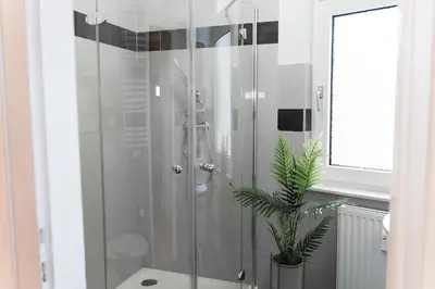Ein Badezimmer in der Unterkunft JUNIK Apartments - Deine Cityapartments in Duisburg