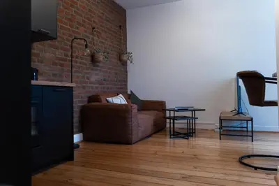 Ein Sitzbereich in der Unterkunft JUNIK Apartments - Deine Cityapartments in Duisburg