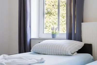 Ein Bett oder Betten in einem Zimmer der Unterkunft Buer Appartment