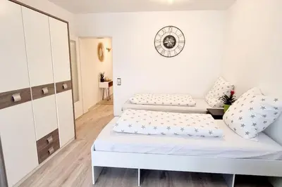 Ein Bett oder Betten in einem Zimmer der Unterkunft Schönes Apartment in Erkrath, Nähe Düsseldorf
