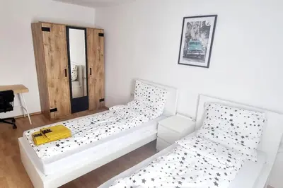 Ein Bett oder Betten in einem Zimmer der Unterkunft Schöne, gemütliche Wohnung, voll ausgestattet
