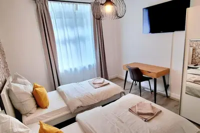 Ein Bett oder Betten in einem Zimmer der Unterkunft Your Cozy Appartment in Wuppertal: Wupper-Home 2