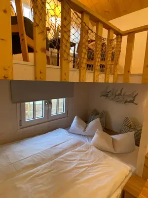 Ein Bett oder Betten in einem Zimmer der Unterkunft Tiny House Lippe im PIER9 Tiny House Hotel