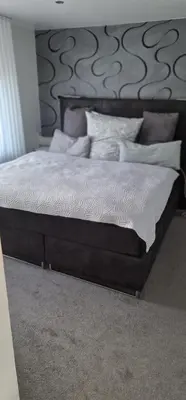 Ein Bett oder Betten in einem Zimmer der Unterkunft Ferienwohnung Sonnenschein