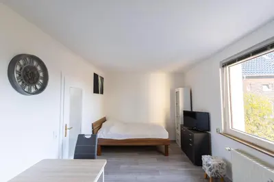 Ein Bett oder Betten in einem Zimmer der Unterkunft Exclusive Home Feeling Flat