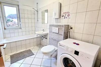Ein Badezimmer in der Unterkunft Modern 3-Room Apartment with Balcony & Free Parking & Free Wi-Fi in Hagen - HA03