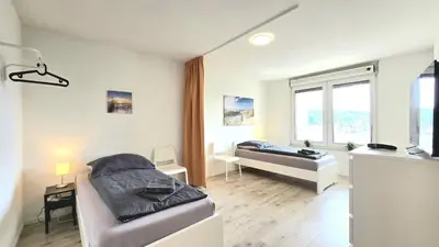 TV/Unterhaltungsangebot in der Unterkunft Modern 3-Room Apartment with Balcony & Free Parking & Free Wi-Fi in Hagen - HA03