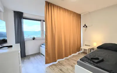 Ein Bett oder Betten in einem Zimmer der Unterkunft Modern 3-Room Apartment with Balcony & Free Parking & Free Wi-Fi in Hagen - HA03